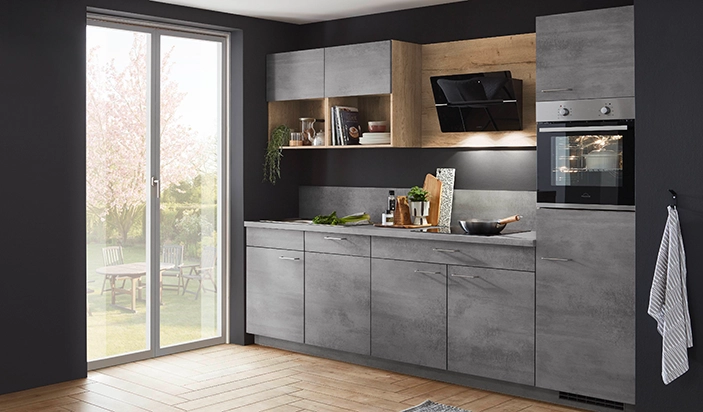 Graue Küchenzeile als Beispiel für die durchdachte Planung einer Singleküche Graue Küchenzeile als Beispiel für die durchdachte Planung einer Singleküche